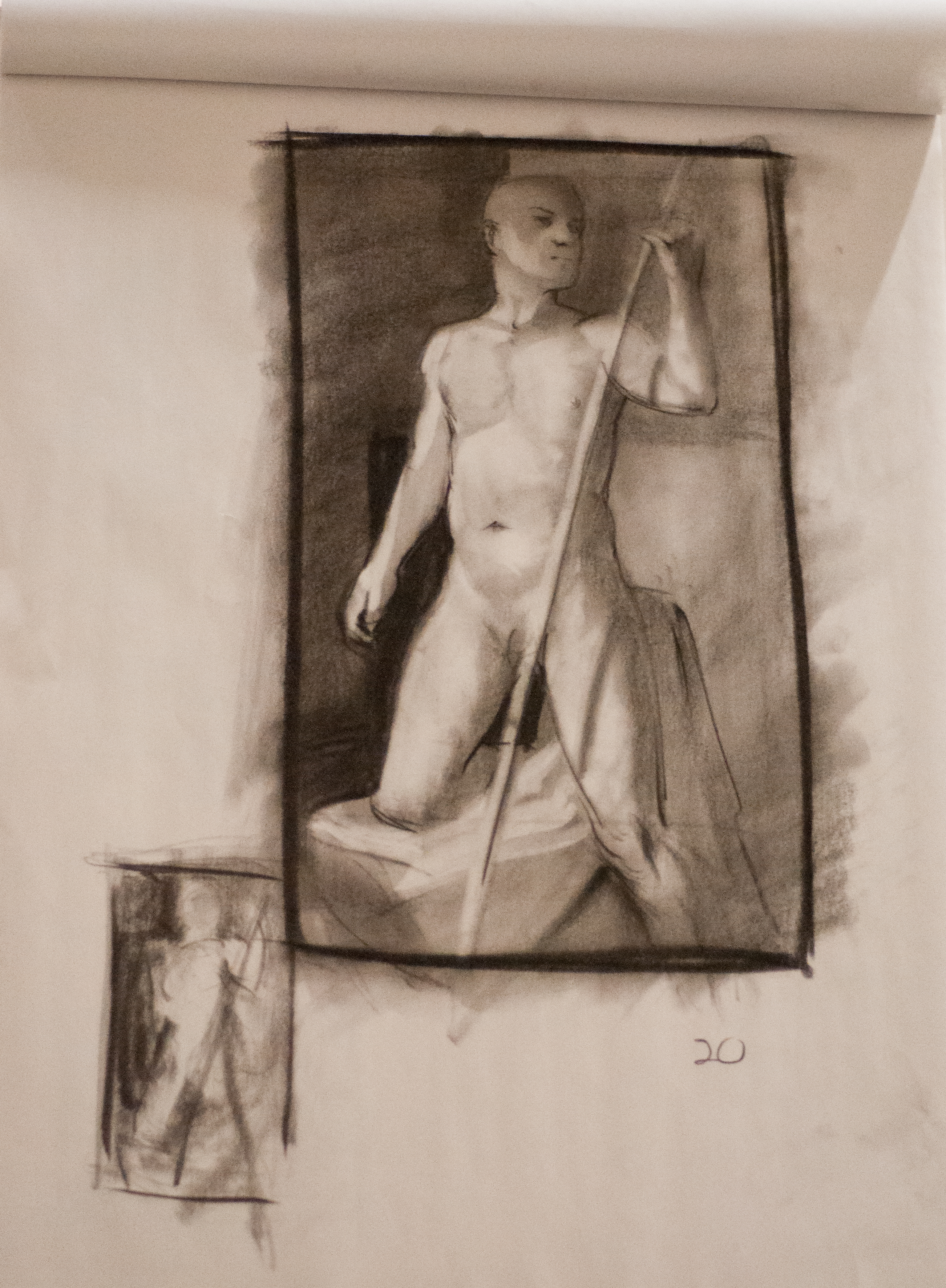 Kneeling Figure with Pole