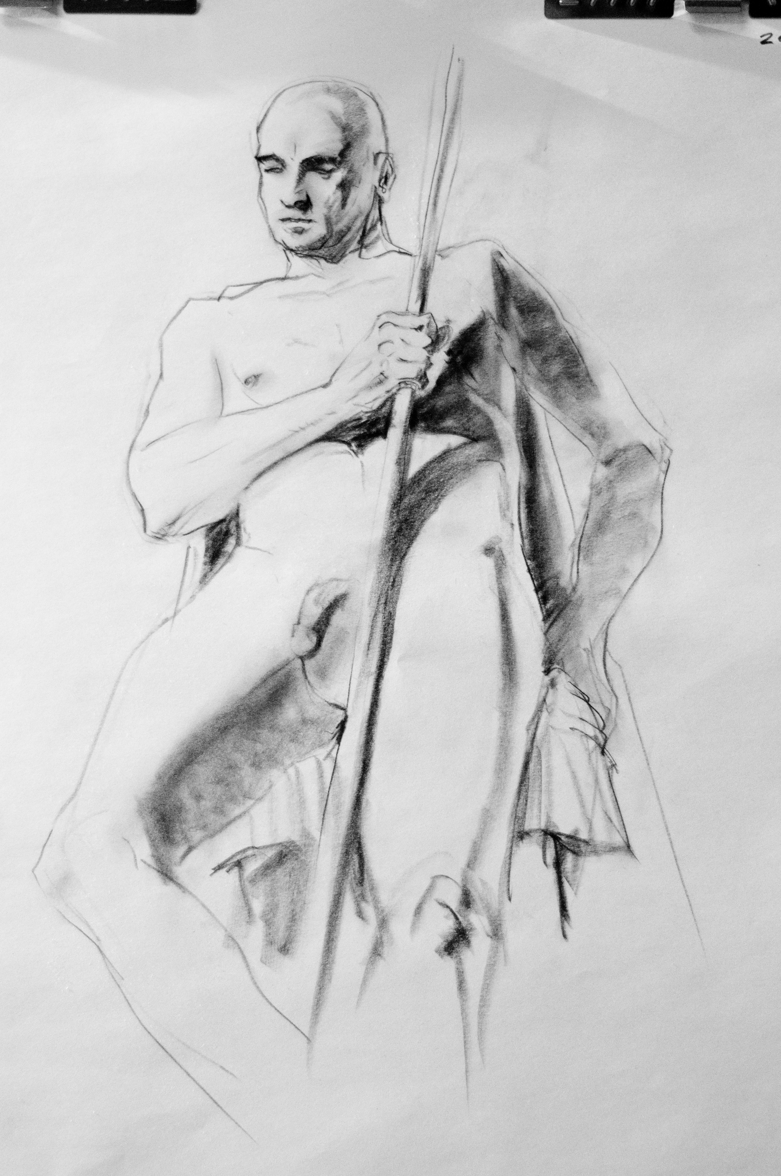 Seated Figure with Staff